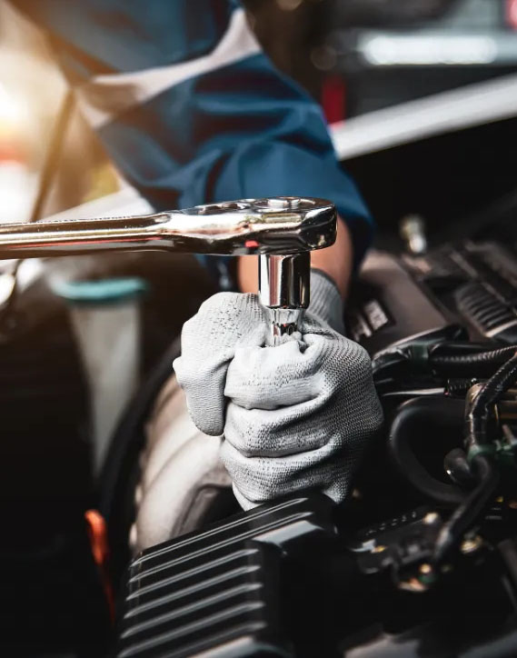 auto tech using wrench